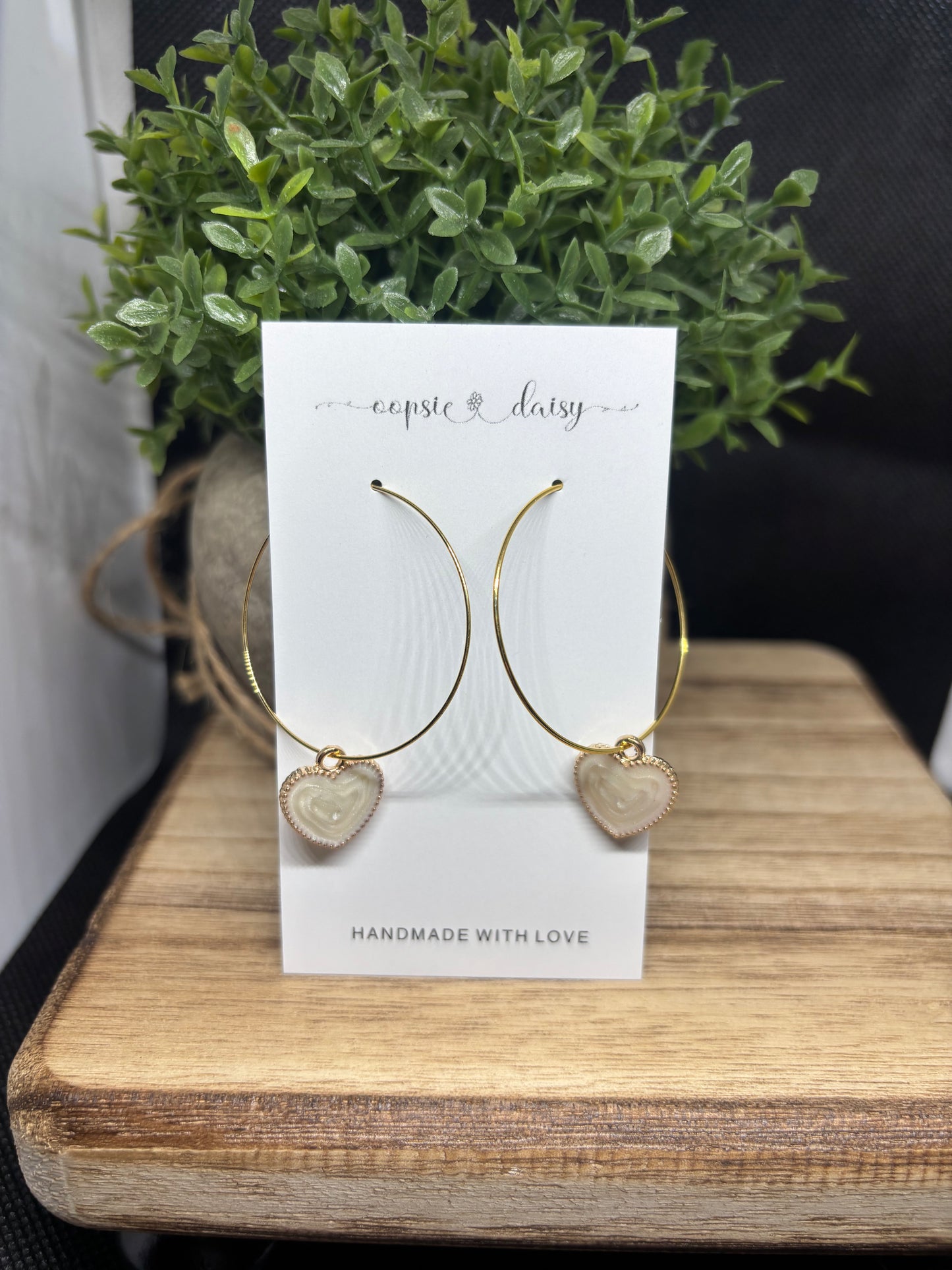 The heart mother of pearl hoops