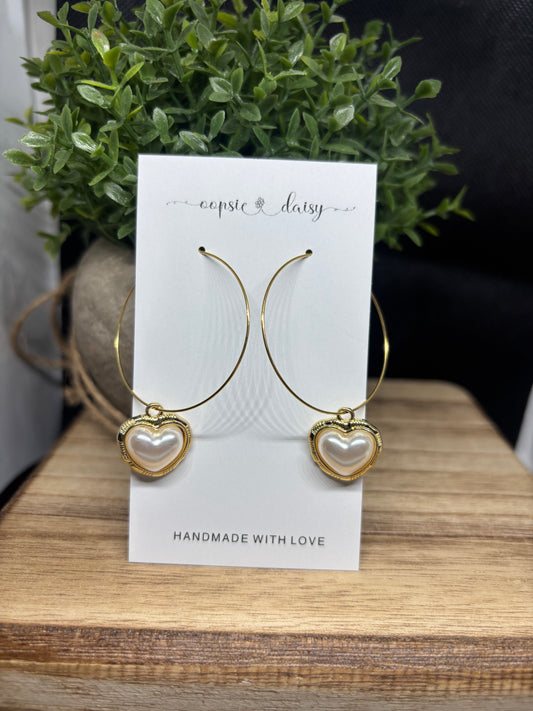 The gold pearl heart hoops