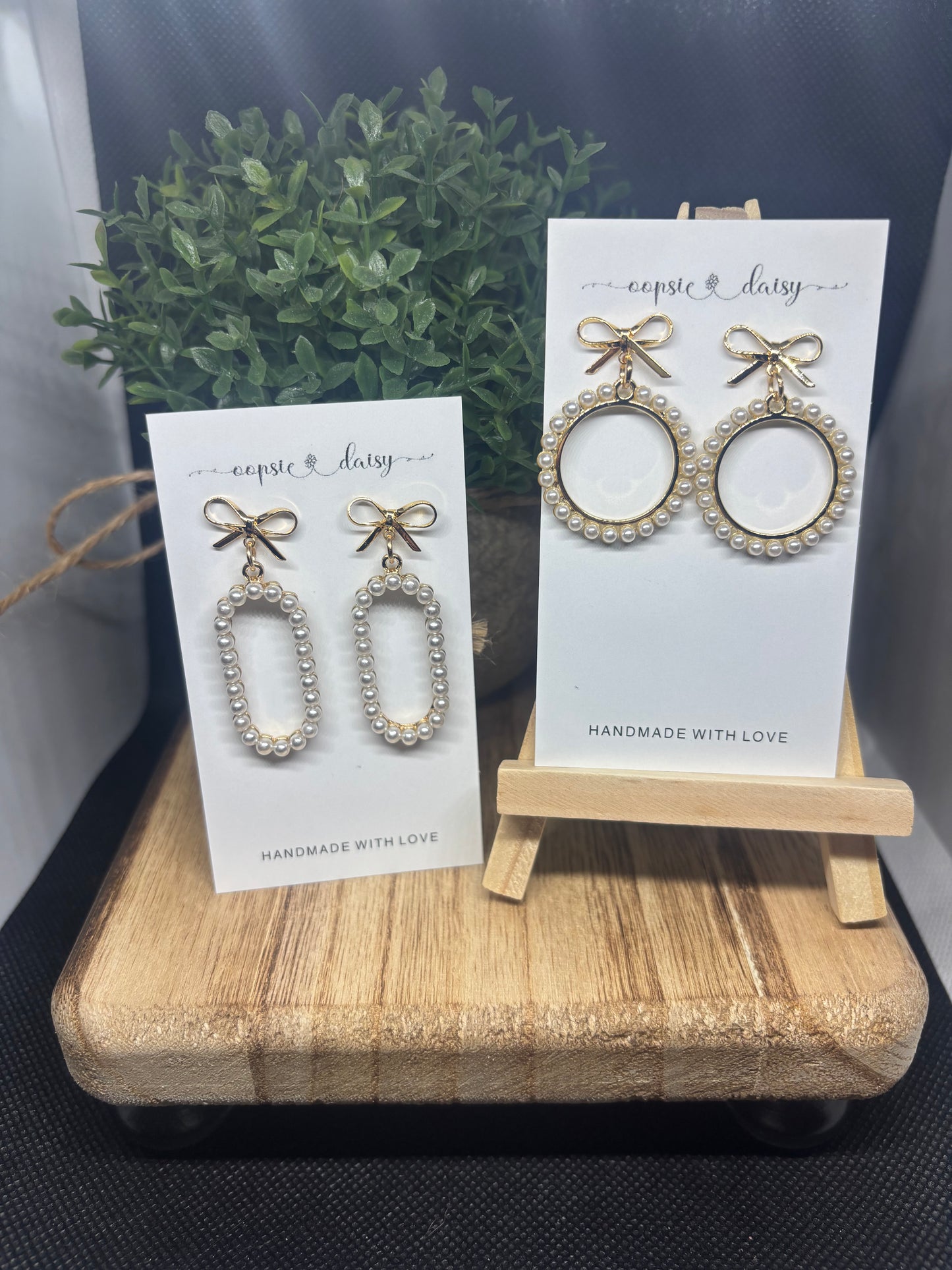 Bow stud with pearl pendant